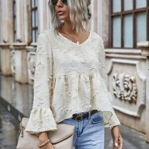 Shein fuzzy notched distressed peplum textured top